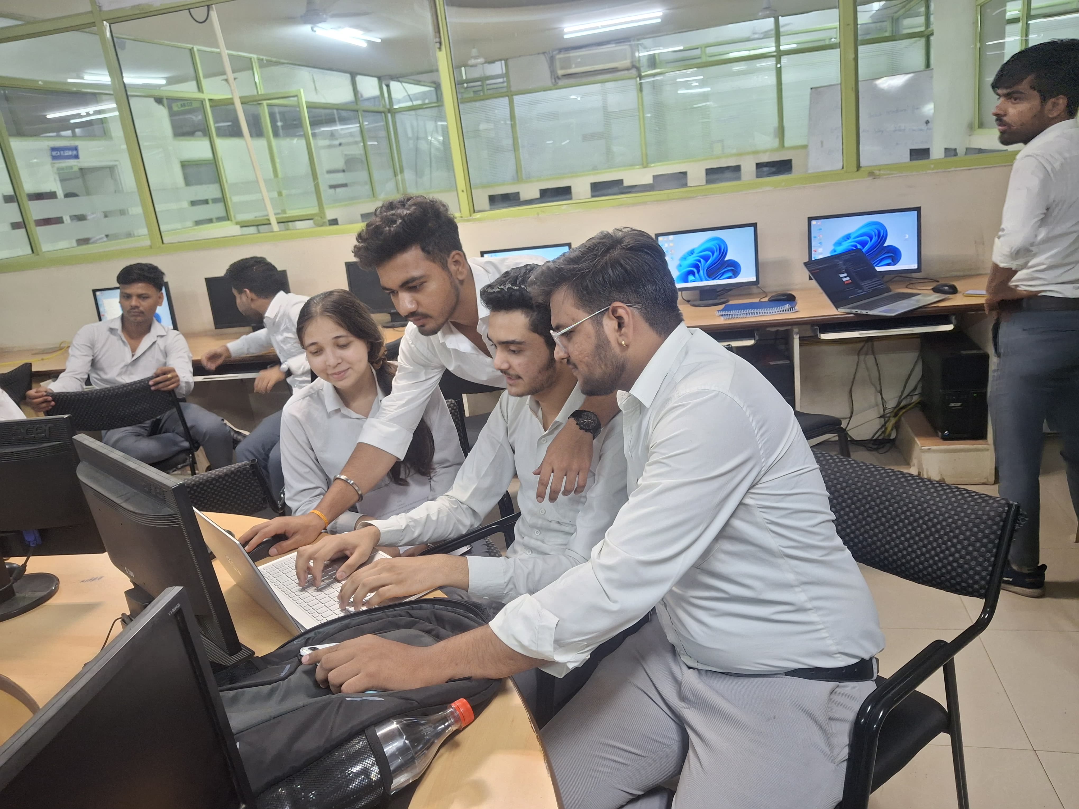 Teacher assisting student in lab